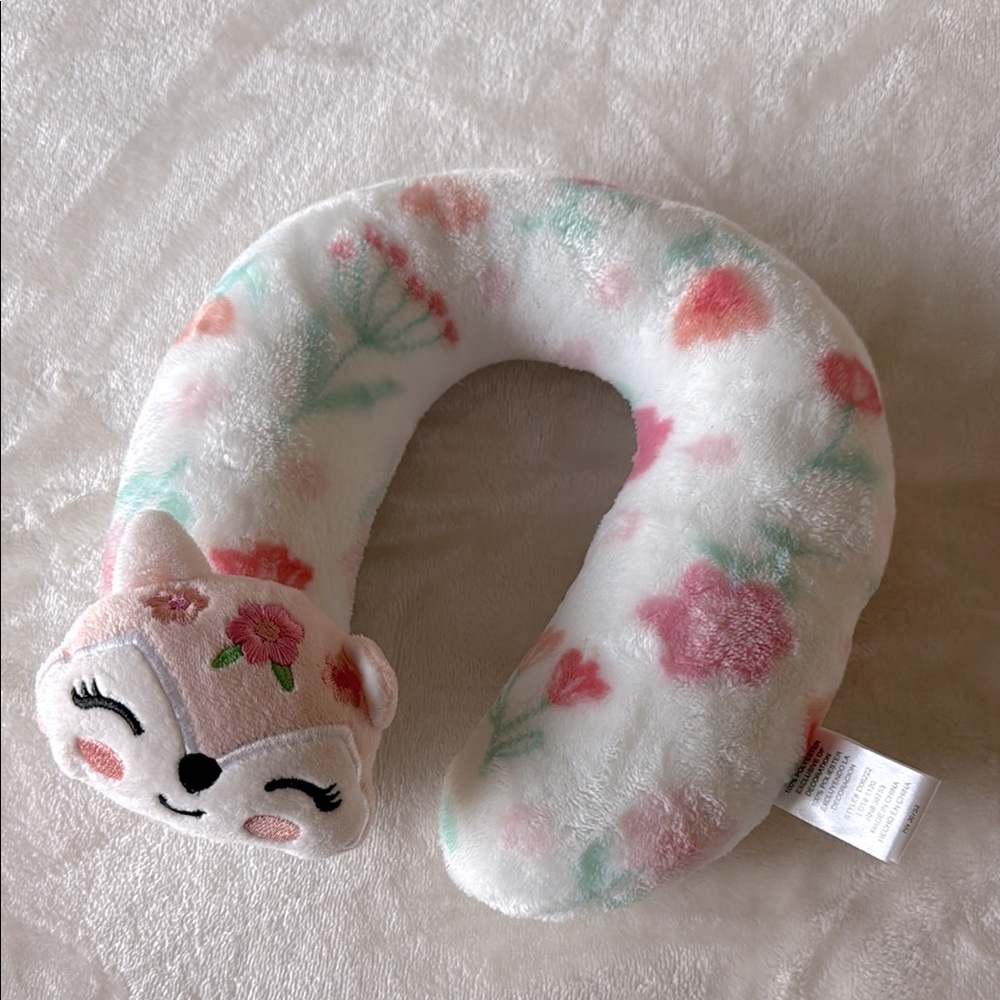 Pink flowered baby travel neck pillow